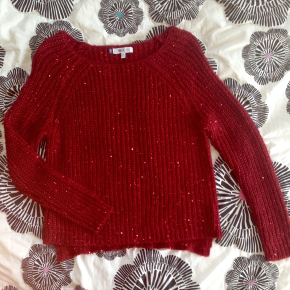 Red knit sweater from Jennifer Lopez
