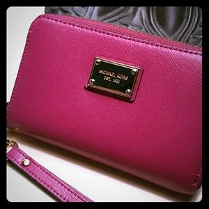 Pink michael kors wristlet