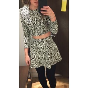 A two piece skirt and matching crop top