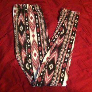 Red black and white patterned leggings