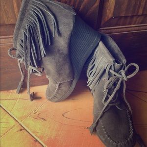 Minnetonka grey fringe wedge booties