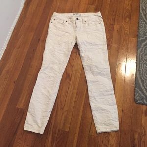 Textured white skinny jeans
