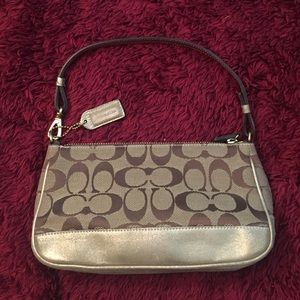 Gold/brown coach handbag