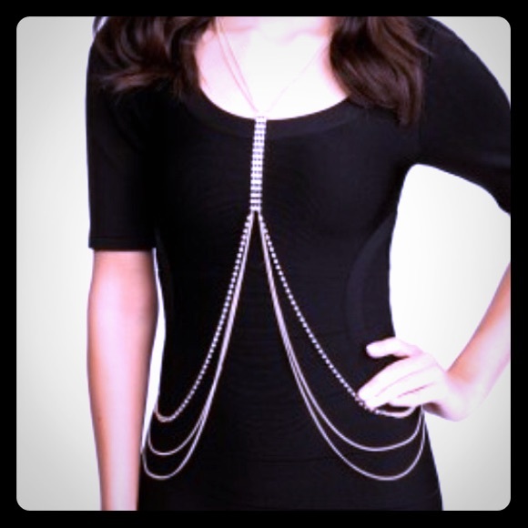 Brand new BEBE draped silver necklace.