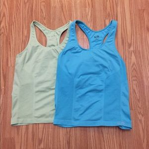 2 Champion workout shirts with built in bra