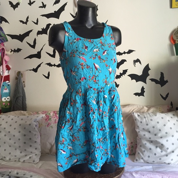 Turquoise bird print dress with heart cutout