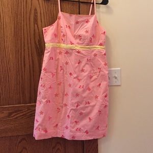 Lilly Pulitzer pink dress with yellow ribbon