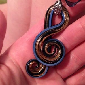 Treble clef necklace