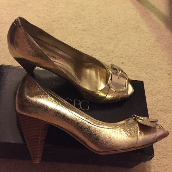 BCBG gold kitten heels with buckle