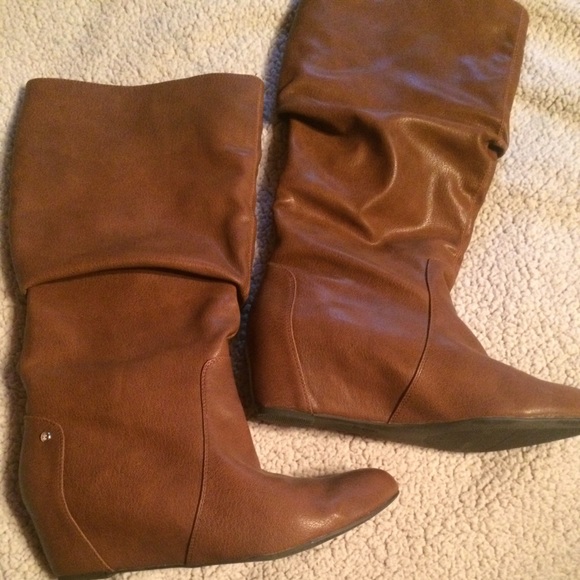 JLO boots with a small wedge