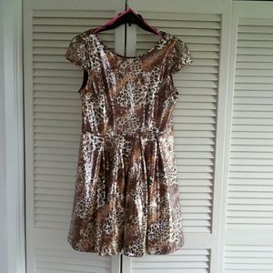 All over animal print sequin fit and flare dress