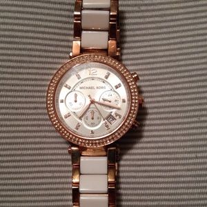 Mk rose gold/white watch.