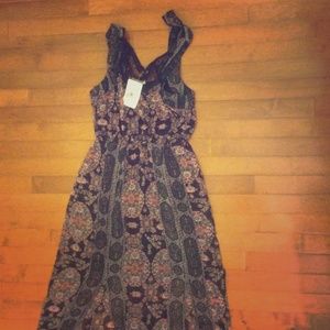 A brand new black free people maxi dress! 💃