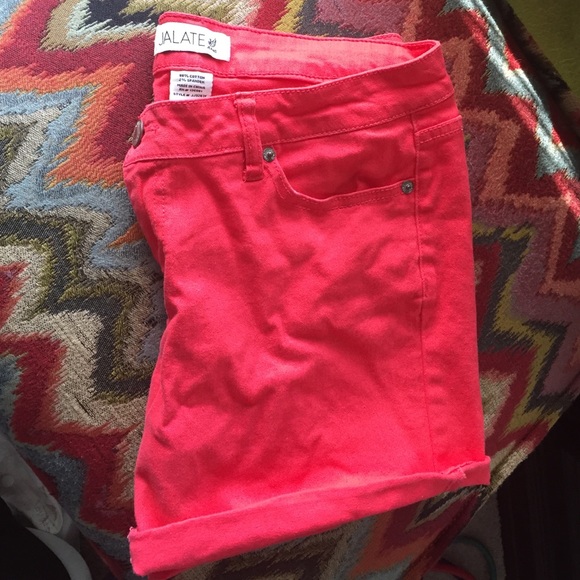 Shorts. Stretchy, cuffed. bright coral/red.