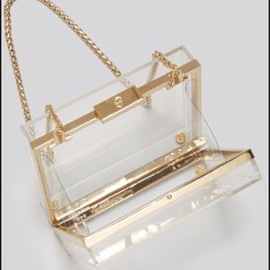 ***ISO*****ISO***Tory Burch Clear Clutch***