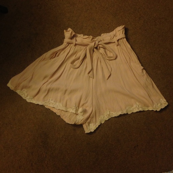 Blush colored lace trim shorts with pockets