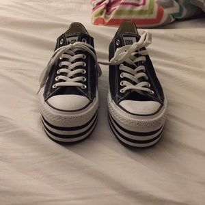 Black and white tall converse