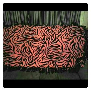 Pink zebra print tie blanket