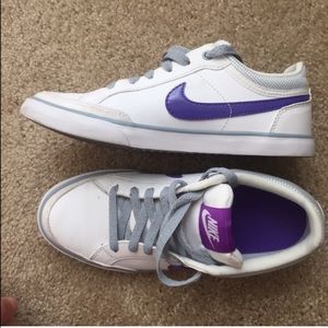 Nike white sneakers.