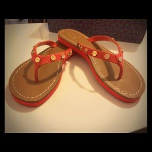 Tory Burch Monogrammed Orange Flip Flops
