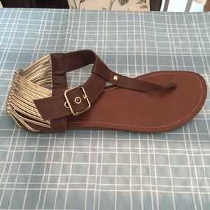 Brown leather shoes with gold back