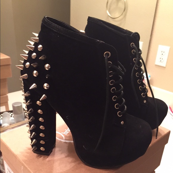 Black spiked heels. Suede Like material