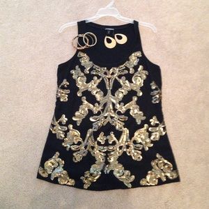 Black and gold sequined express top.