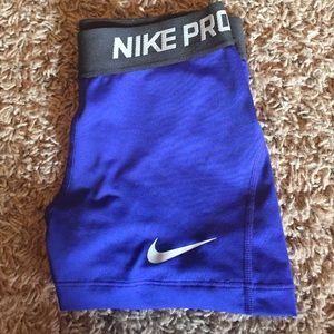 Blue Nike pro spanks.
