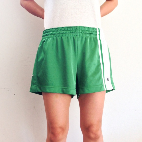 Green striped Nike shorts