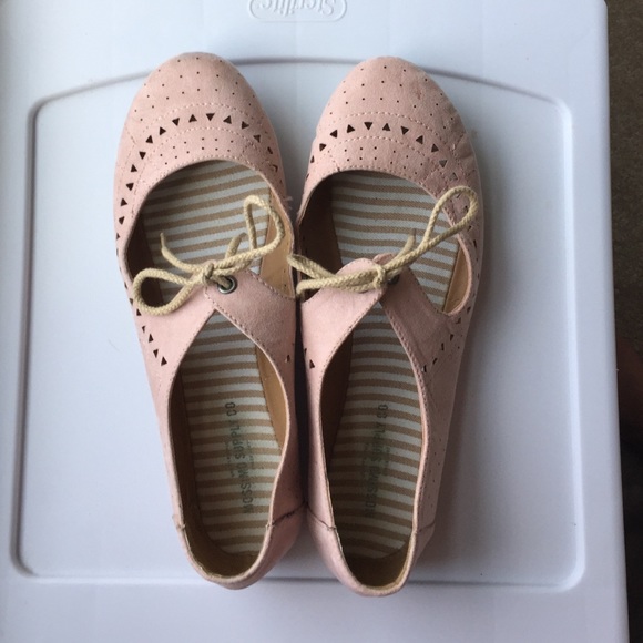 Pink ballet flats with cutouts