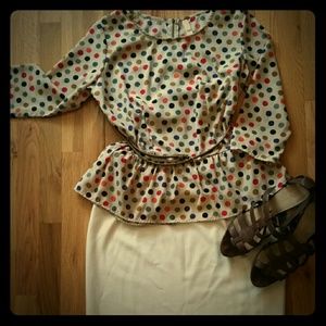 Retro inspired polka dot peplum top