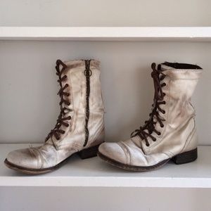 Satin distressed lace up boots.