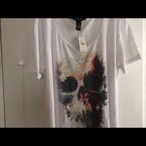 White t shirt with cuffed short sleeve shirt.