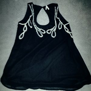 Versatile black sleeveless keyhole top