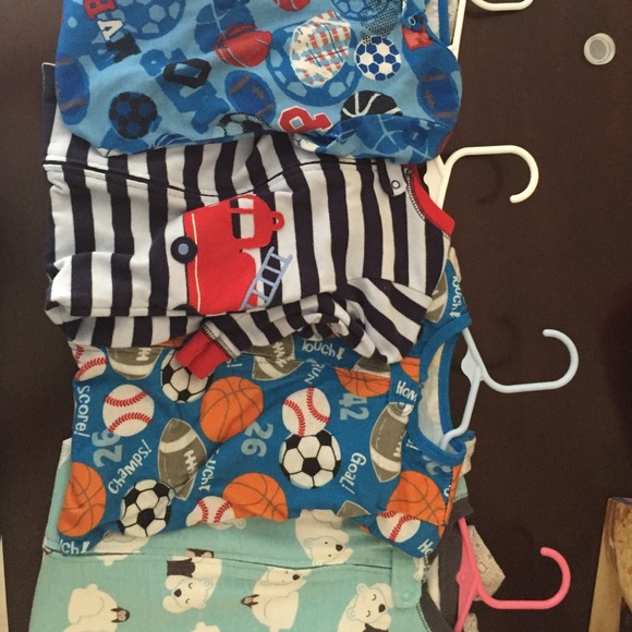 Four 18 month old footed onesies!