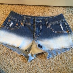 Jean to white faded shorts