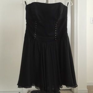 Strapless black BEBE cocktail dress.