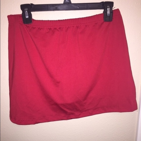 Red athletic skirt with shorts