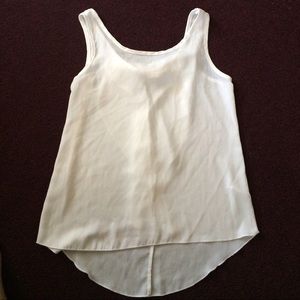 White shirt with bow in the back