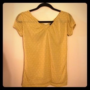 Yellow and white geometric pattern top