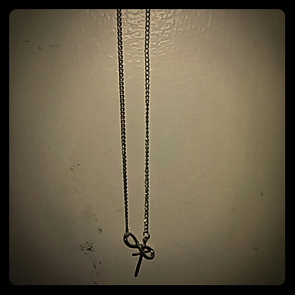 Cross infinity necklace
