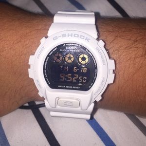 White G-shock watch with black face