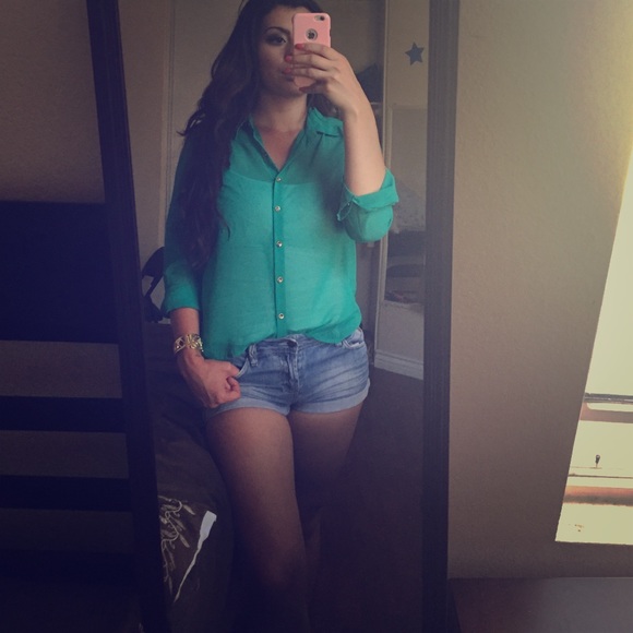 Sheer torquois blouse.