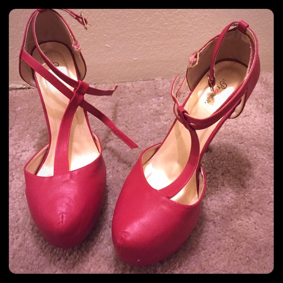 Red high heeled pumps