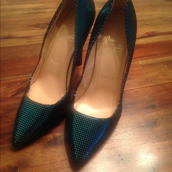 Like new Louboutins with small repaired damage