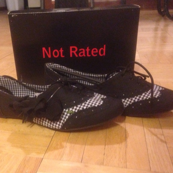 black/argyle pattern Oxford shoes. never worn.