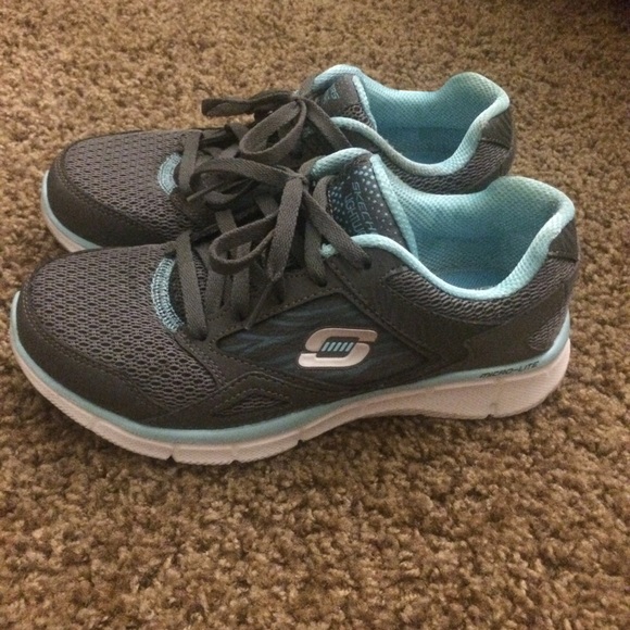 Blue and gray running shoes