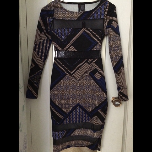 Long sleeve, knee high dress.