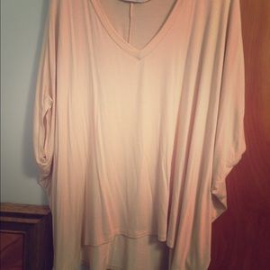 Beige winged v-neck dolman top. Never worn.