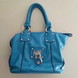 Blue purse with gold accents